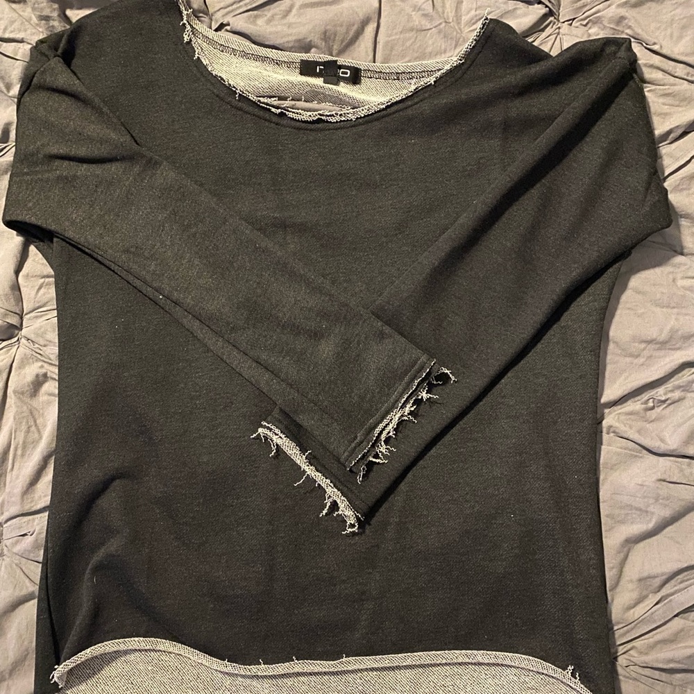 Super cute sweater with cut out design on back